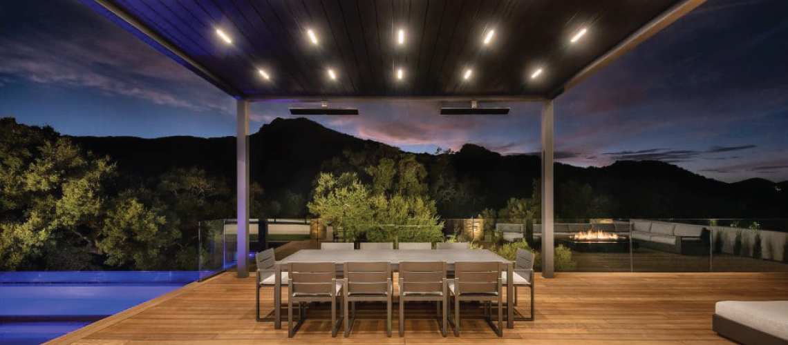 Two Electric Patio Heaters Mounted on an Outdoor Gazebo Over an Outdoor Dining Table and Chairs and Wood Deck