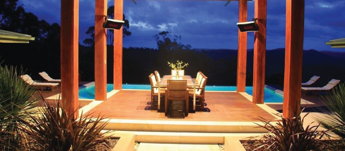 Two Gas Heaters Mounted to two Posts of Outdoor Gazebo Over a Deck in Backyard