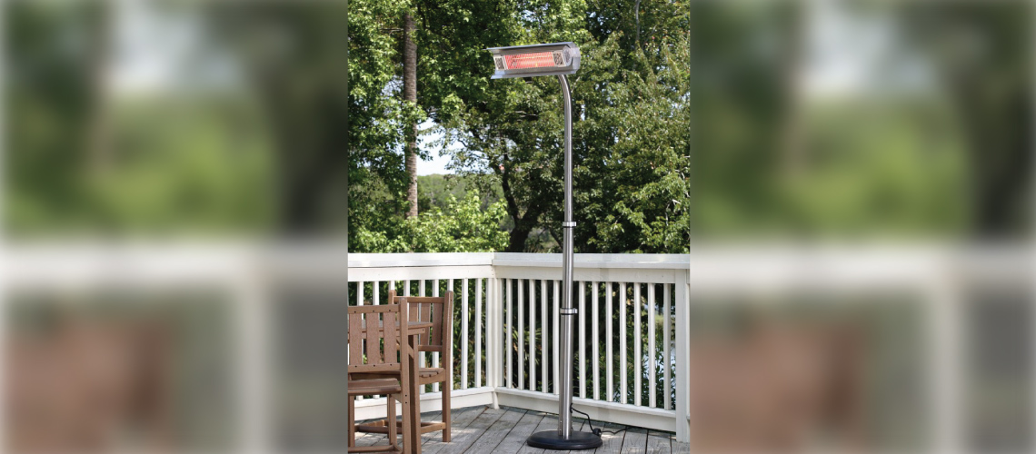 Outdoor deck scene with grey wood floors, white rail, brown wooden outdoor chairs and freestanding Fire Sense 02117 patio heater on the deck