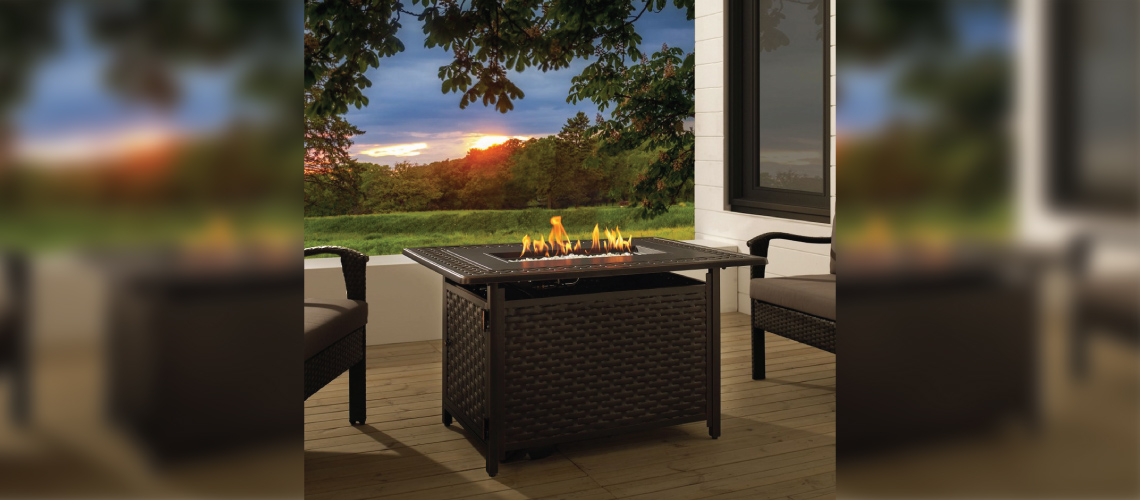 Rectangle Fire Pit Table on a Wood Deck Overlooking the Sunset