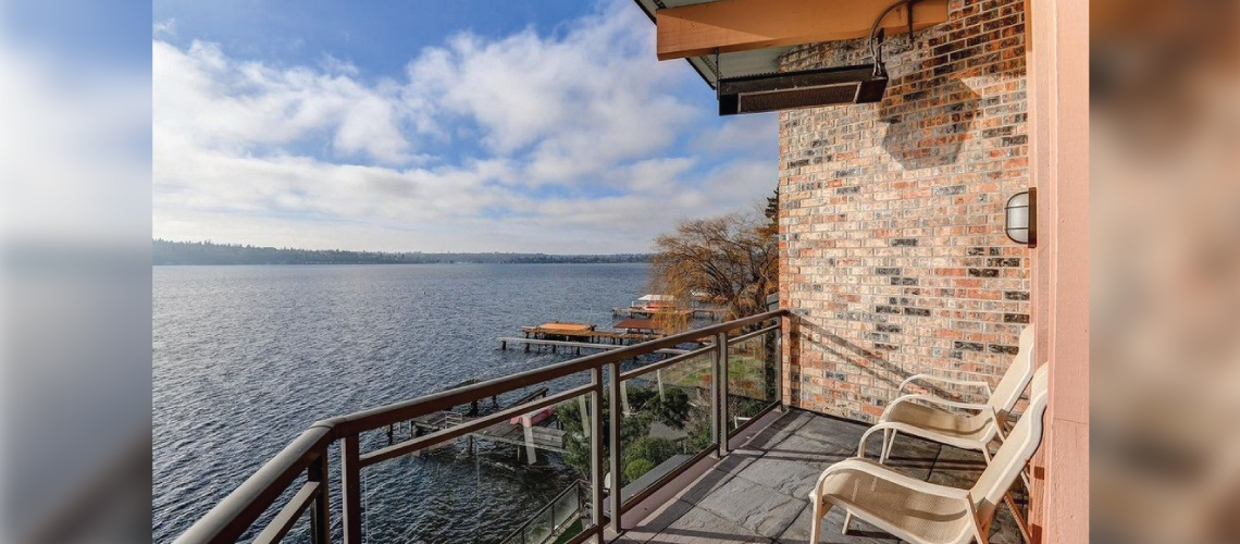 one liquid propane ceiling mounted heater on an outdoor patio overlooking a lake