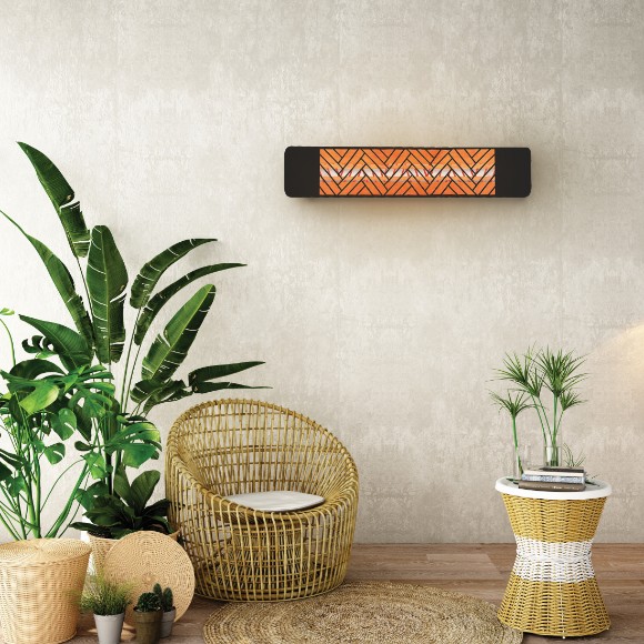 an innova heater in a trendy boho themed patio with a decorative chevron face plate