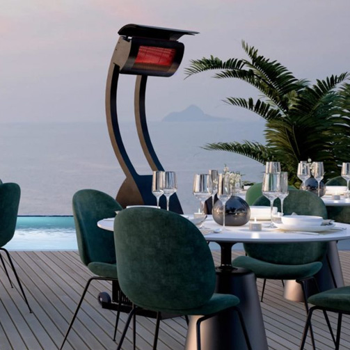 portable tungsten heater warming an outdoor coastal restaurant table
