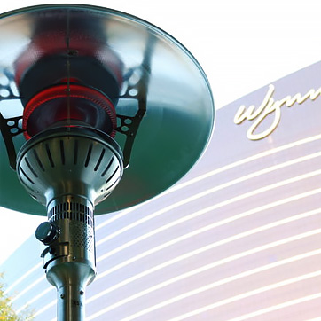 EvenGlo Heater by IR Energy from below in front of a large hotel