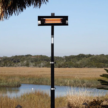 Portable electric heater next to feilds