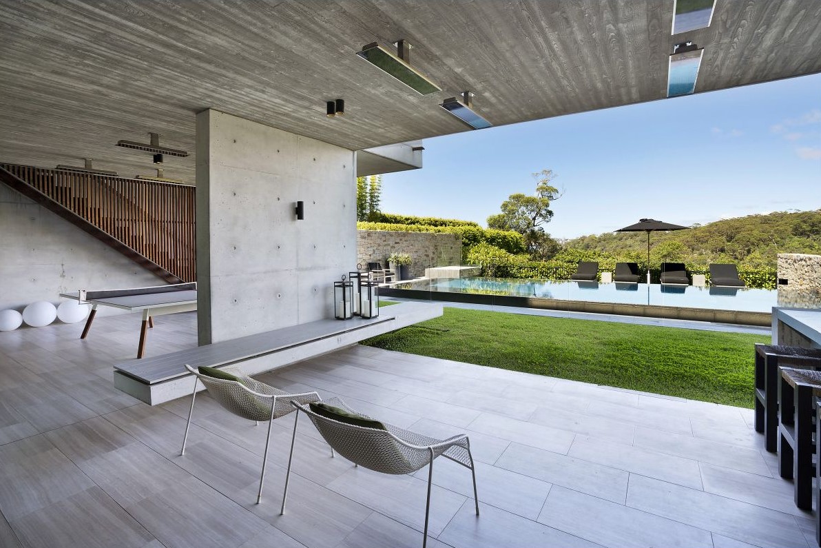 bromic platnum heater installed in the ceiling of a modern patio