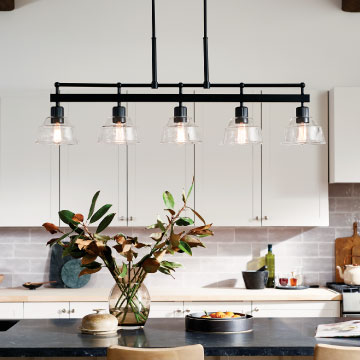 linear chandelier over a kitchen island
